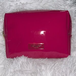 YSL makeup bag. YvesSaintLaurent hot pink Beaute